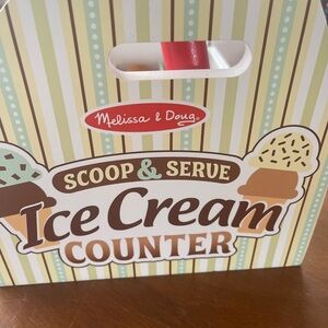 Melissa & Doug Scoop & Serve Ice Cream Counter with Striped Design